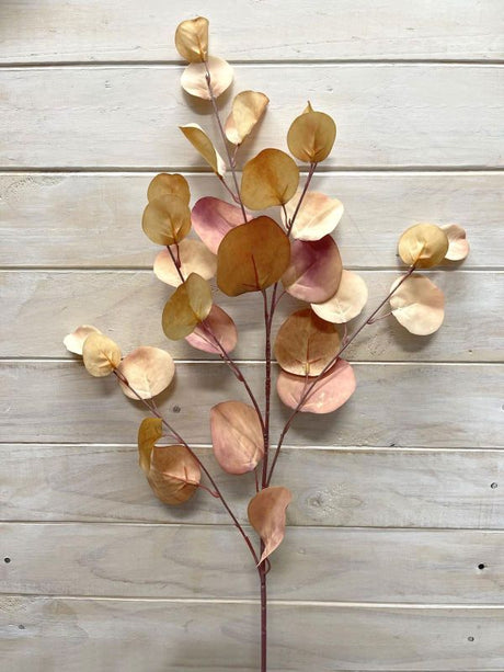 Lifelike brown eucalyptus spray adds elegance to home decor, perfect for arrangements and accenting any space.