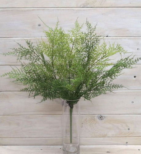 Lifelike green artificial leather fern bush, perfect for home decor and maintenance-free greenery.