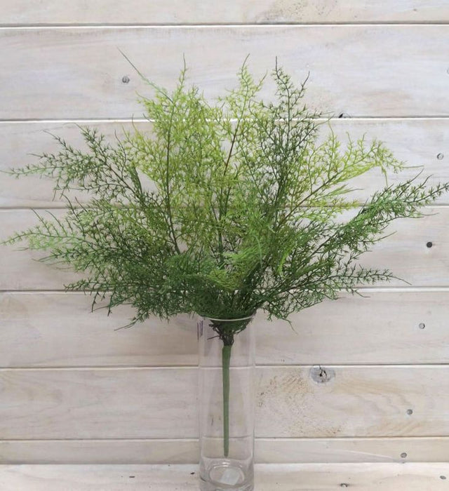 Lifelike green artificial leather fern bush, perfect for home decor and maintenance-free greenery.