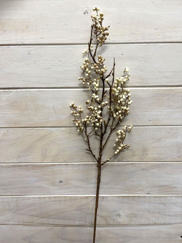 Cream artificial mini berry spray, featuring realistic berries for elegant home decor in floral arrangements and centerpieces.