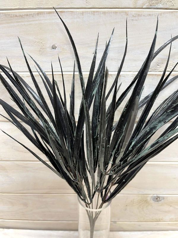 Artificial black grass bush, realistic and low-maintenance, perfect for enhancing indoor and outdoor spaces.