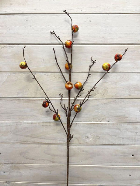 Vibrant orange artificial eucalyptus nut spray, perfect for stylish home decor and floral arrangements.