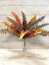 Vibrant Artificial Autumn Boston Fern Bush with rich colors, perfect for hassle-free home decor and year-round greenery.