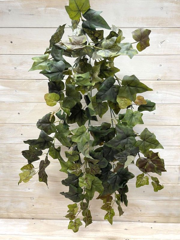 Lifelike green artificial hanging African ivy bush, perfect for indoor decor with no maintenance needed.