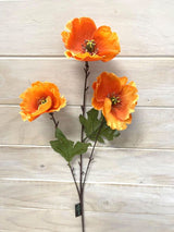 Vibrant orange artificial poppy spray with three lifelike flowers, perfect for brightening any home decor.