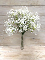 Elegant white artificial baby breath spray, perfect for home decor, weddings, and events, offering lasting beauty without maintenance.