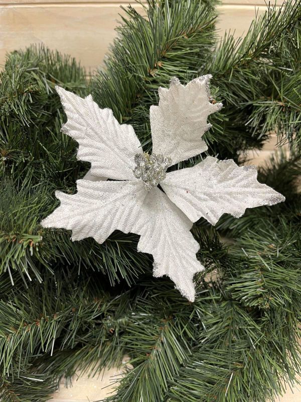 Elegant silver artificial star poinsettia head, perfect for holiday decor and floral arrangements, adding sparkle and sophistication.
