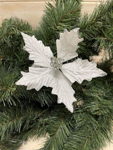 Elegant silver artificial star poinsettia head, perfect for holiday decor and floral arrangements, adding sparkle and sophistication.