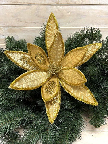 Stunning gold artificial poinsettia with long petals, perfect for holiday decor and elegant arrangements.
