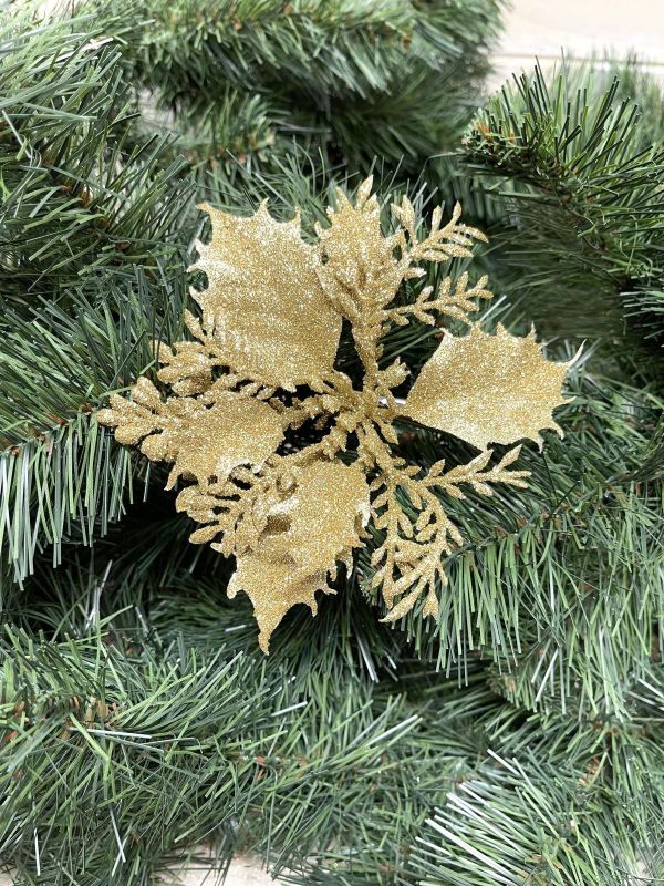 Lifelike gold artificial poinsettia pick with sparkling glitter accents, perfect for festive decor and arrangements.