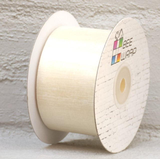 Elegant ivory organza ribbon, 50mm wide, 50m long, perfect for weddings, gift wrapping, and crafting projects.