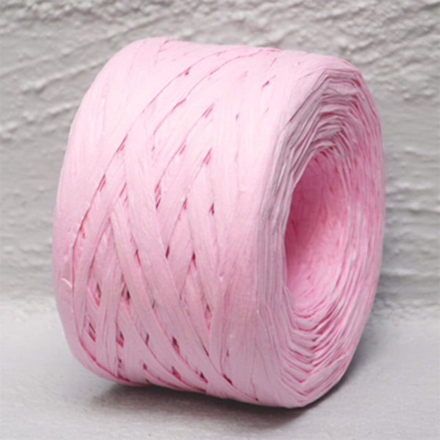 Pale pink 4mm x 100m paper raffia ribbon, ideal for crafting, gift wrapping, and floral arrangements.