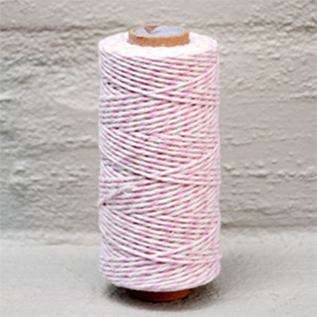 Natural-colored 2mm baker's twine on a 100m roll, ideal for crafting, baking, and decorating with rustic charm.