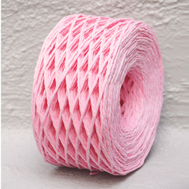 Eco-friendly pale pink paper twine, 2mm thick and 100m long, ideal for crafting, gift wrapping, and DIY projects.