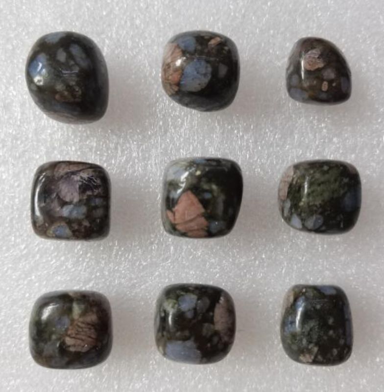 Tumbled Blue Labradorite and Blood Jasper stones, showcasing unique patterns, perfect for decoration, healing, or jewelry making.