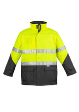Bright yellow and navy men's hi-vis storm jacket with reflective tape, waterproof, quilt-lined, and adjustable for visibility and comfort.