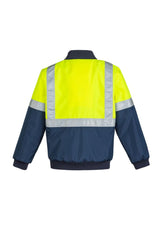 High-visibility yellow and navy quilted flying jacket with reflective tape, waterproof, and ribbed collar, ideal for outdoor work.