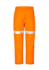 Men's orange waterproof storm pants by Syzmik, size 5XL, made from durable polyester with reflective tape and ankle zips.