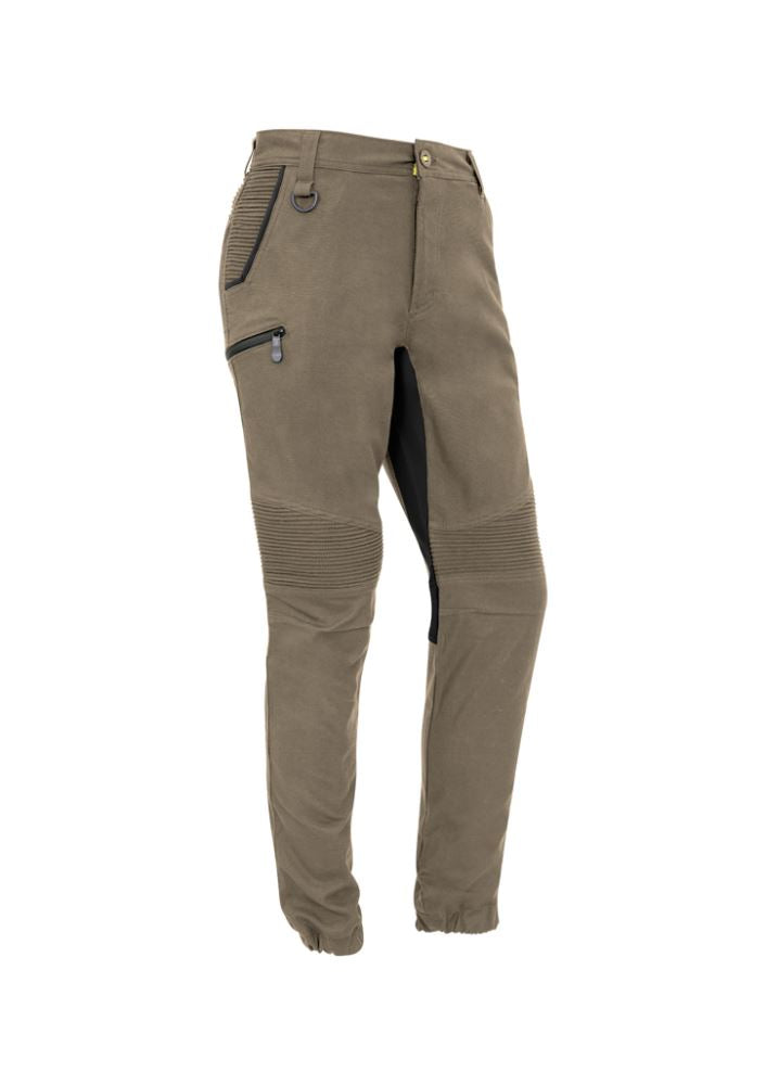 Men's khaki stretch pants by Syzmik featuring elastic cuff, four-way stretch, and multiple pockets for comfort and functionality.