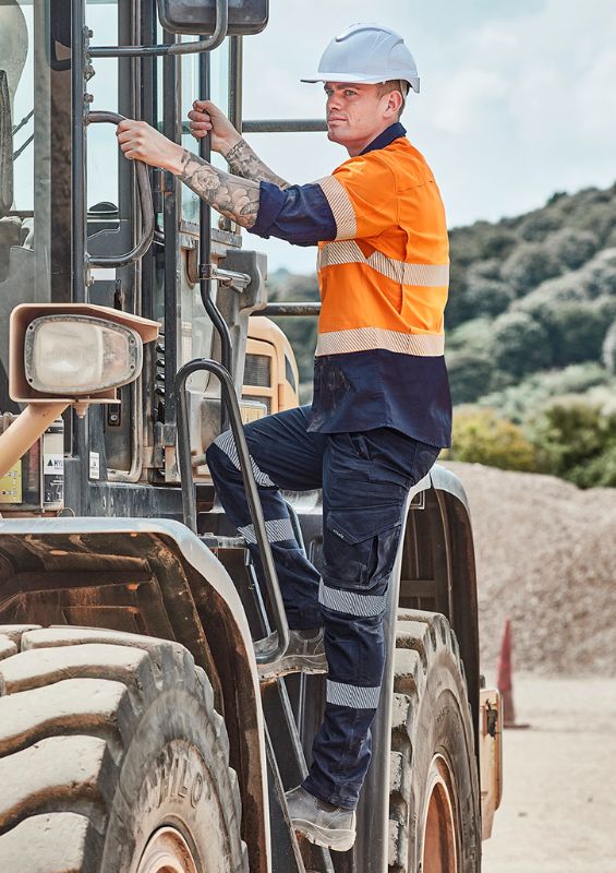 Men's navy rugged pants featuring ripstop fabric, stretch for movement, reflective tape, and ample storage pockets.