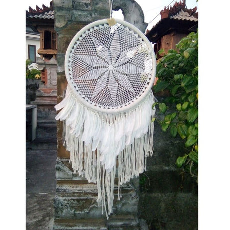 White Boho Dreamcatcher 50cm featuring soft white feathers and intricate details, perfect for adding tranquility to any space.