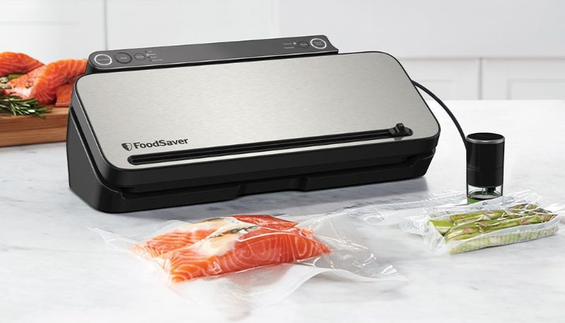 FoodSaver Controlled Multi Seal by Sunbeam, a stainless steel vacuum sealer with five settings for preserving food freshness.