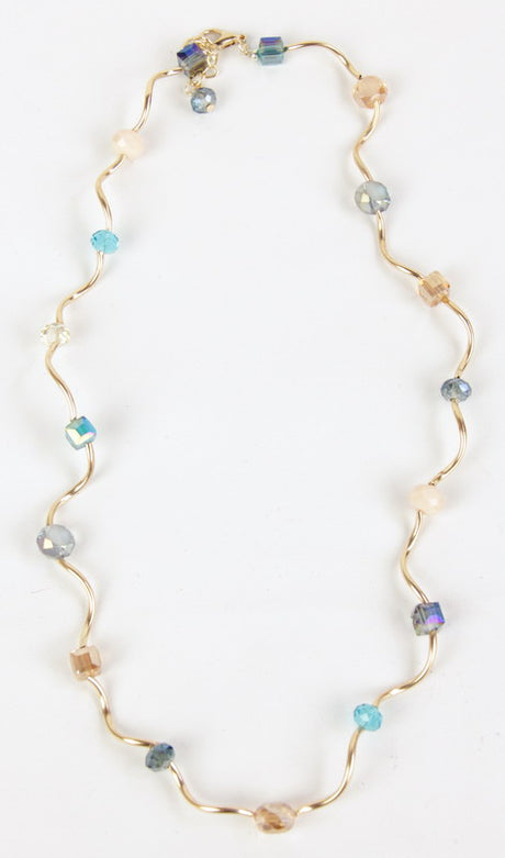 Elegant blue ripple necklace with shimmering design, 18-inch length, and 3-inch extension for versatile styling.