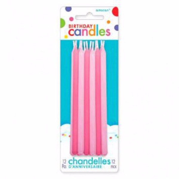 Pack of 12 pink slimline tapered candles, 13cm long, perfect for elegant decor and creating a warm ambiance.