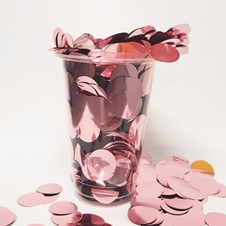 Light pink metallic confetti circles, 2cm each, 200g bag, perfect for adding sparkle to parties and special events.