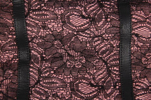 Chic pink PU leather bag with lace details, perfect for stylishly carrying essentials on any occasion.