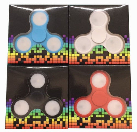 Colorful LED fidget spinner set in red, white, black, and light blue, designed for stress relief and endless fun.