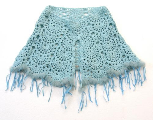 Baby blue poncho with luxurious fur trim and playful tassels, perfect for stylish warmth in cooler weather for babies and toddlers.