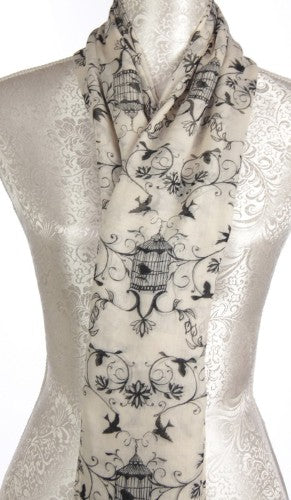 Elegant black and white Birdcage scarf made of soft polyester, measuring 180 x 73 cm, perfect for any occasion.