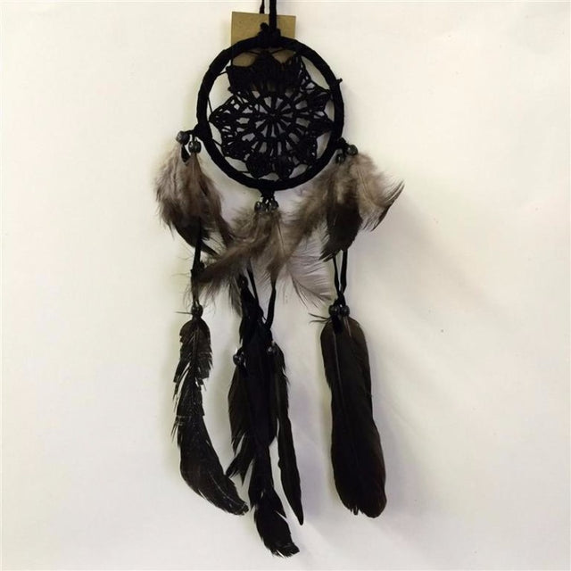 Black 9cm dream catcher featuring intricate webbing and beads, symbolizing protection and good dreams for restful sleep.