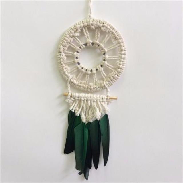 Handcrafted green macrame dream catcher, 12cm, perfect for decor and dream protection, adding bohemian charm to any space.