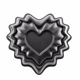 Mini Heart Bundt Pan made of heavy aluminum, non-stick, 3-cup capacity, perfect for charming heart-shaped desserts.