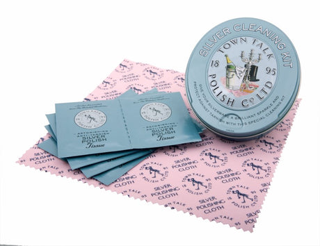 Tinned Silver Cleaning Kit featuring 8 polish tissues and a cloth, elegantly packed for effortless silver restoration.