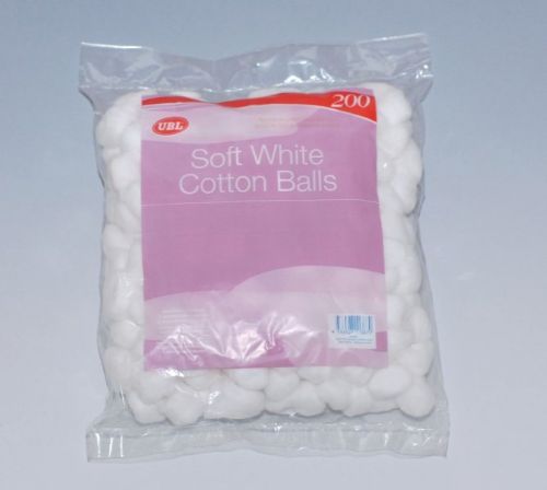 Set of 3 packs of white cotton balls, 600 pieces total, soft, hypoallergenic, ideal for beauty and crafting use.