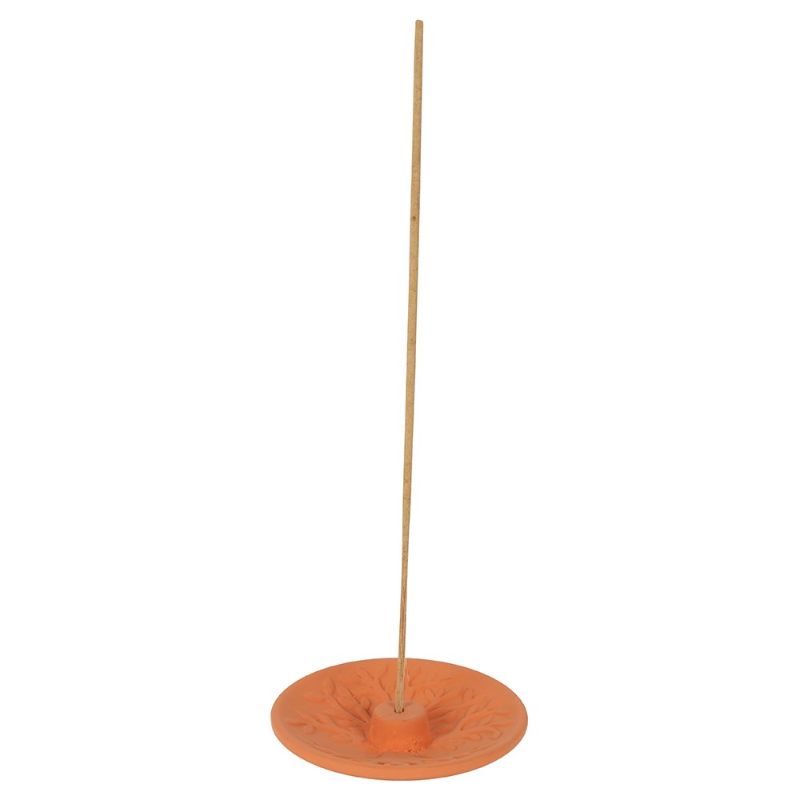 Beautiful terracotta incense plate with intricate Tree of Life design, perfect for meditation and home decor.