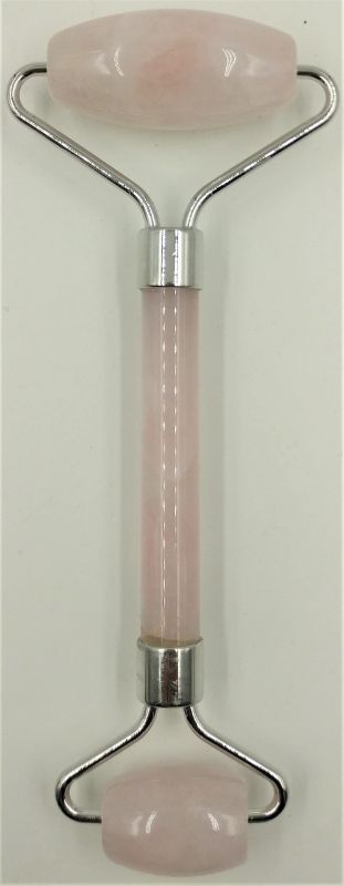 Rose quartz facial roller for rejuvenating skin, reducing puffiness, and enhancing self-care routines. Ideal for all skin types.