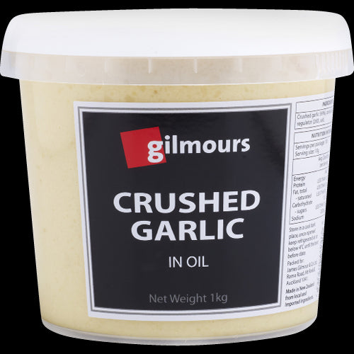 Gilmours Crushed Garlic in Oil, 1kg jar, ideal for enhancing dishes with rich, aromatic garlic flavor and cooking convenience.