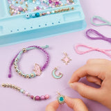 Colorful bracelet-making kit for tweens, featuring cords, 260 beads, charms, and a PlayTray for organized crafting.