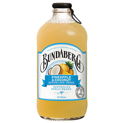 Bundaberg Pineapple & Coconut drink in 12 x 375ml bottles, featuring real fruit extracts for a refreshing tropical flavor.