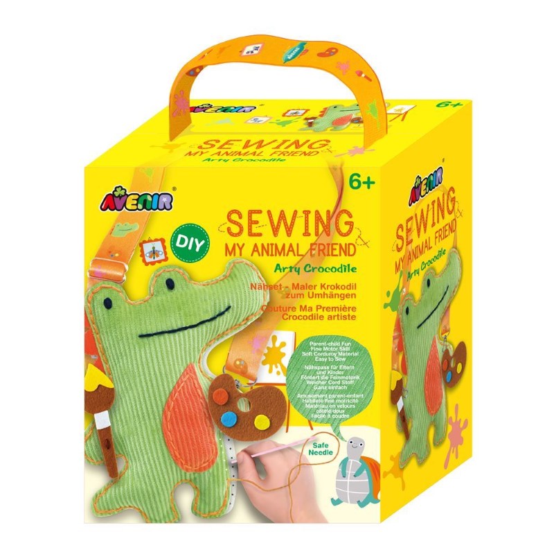 Sewing kit featuring a soft corduroy crocodile, ideal for kids to create a cuddly friend with vibrant stickers and safety needle.