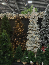 7' Black Luxury Pine Tree with 1700 tips, elegant design, and perfect for modern holiday decor.