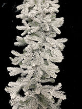 200 cm snowy garland with 324 tips and warm LED lights, perfect for adding festive elegance to your holiday decor.