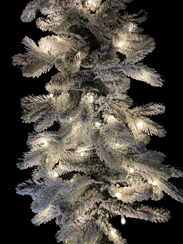 200 cm snowy garland with 324 tips and warm LED lights, perfect for festive home decorations.