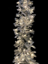200 cm snowy garland with warm LED lights, featuring 324 tips for a festive winter wonderland in your home.
