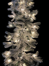 200 cm snowy mixed pine garland with warm LED lights, featuring 324 tips for festive decoration and elegance in any space.
