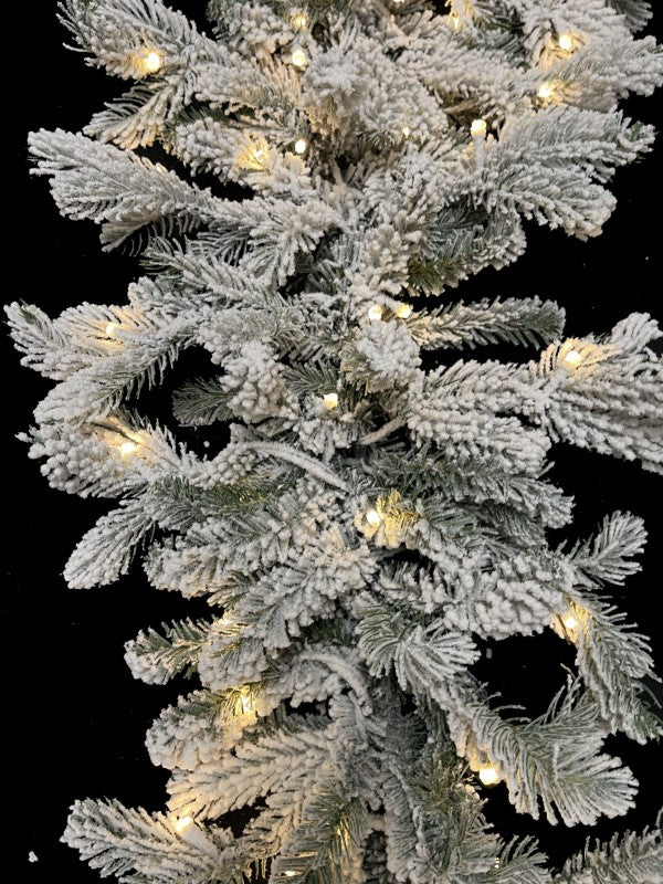 200 cm snowy Christmas garland with warm LED lights, featuring 324 tips for a festive and cozy home atmosphere.